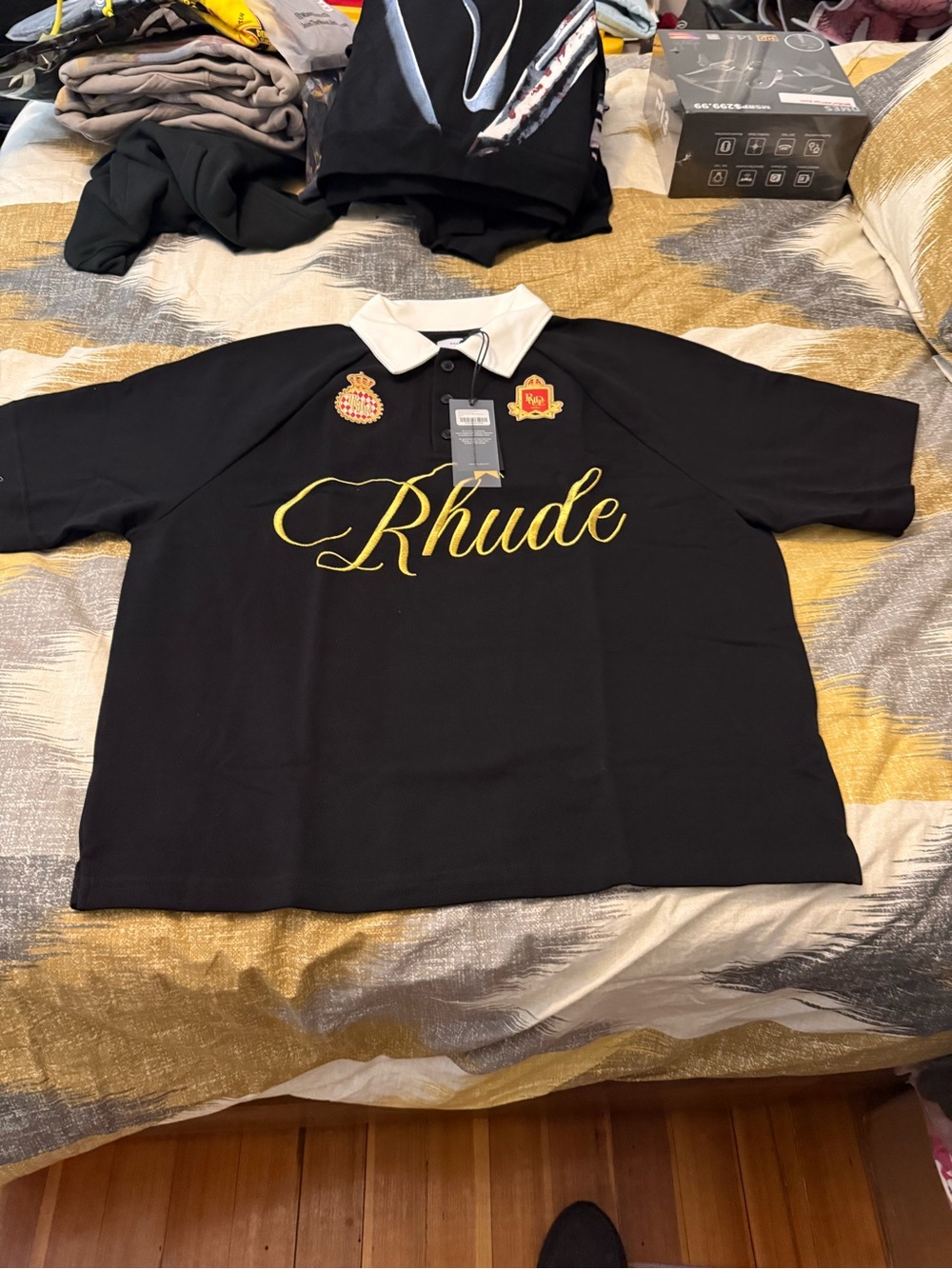 Rhude Men’s Black Polo Top with White Collar and Gold Embroidery